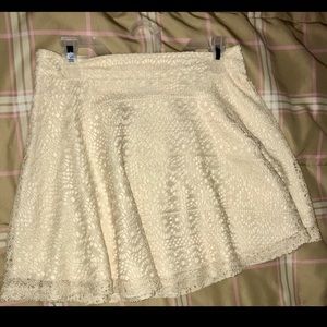 White/beige mini skirt